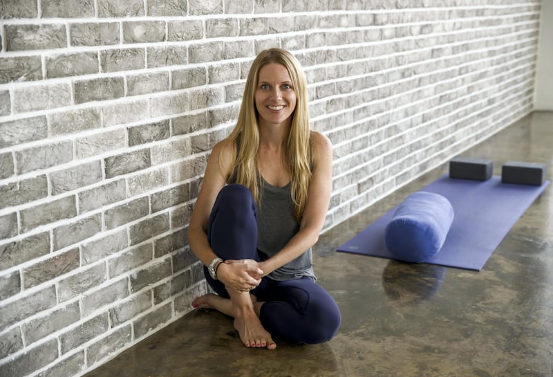 Dubai, United Arab Emirates - September 17th, 2017: Kimberley Stokes, co-Founder and Managing Partner of Urban Yoga. After working 80 hours a week for six years in Management Consulting, Kimberley decided to follow her dream of starting and growing a small business and launched Urban Yoga in 2013 as a keen yogi of 10 years. Here, she discusses how she was brought up tracking all childhood expenses and how that affected her attitude to money and entrepreneurship. Sunday, September 17th, 2017, Urban Yoga, Business Bay, Dubai. Chris Whiteoak / The National