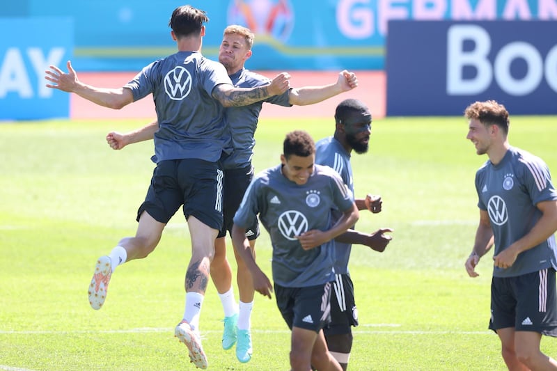 Robin Koch and Joshua Kimmich messing around during training. Getty
