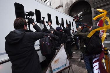 People surround a van carrying Julian Assange to the Old Bailey in London, England. Getty Images
