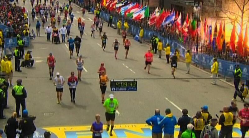 Still image taken from video courtesy of NBC shows an explosion at the Boston Marathon, April 15, 2013. Two explosions struck the marathon as runners crossed the finish line on Monday, witnesses said, injuring an unknown number of people on what is ordinarily a festive day in the city. REUTERS/NBC/Handout (UNITED STATES - Tags: CRIME LAW SPORT ATHLETICS) FOR EDITORIAL USE ONLY. NOT FOR SALE FOR MARKETING OR ADVERTISING CAMPAIGNS. THIS IMAGE HAS BEEN SUPPLIED BY A THIRD PARTY. IT IS DISTRIBUTED, EXACTLY AS RECEIVED BY REUTERS, AS A SERVICE TO CLIENTS. NO ARCHIVES. CNN OUT. AOL OUT. YAHOO OUT *** Local Caption ***  TOR802_USA-BOSTON M_0415_11.JPG