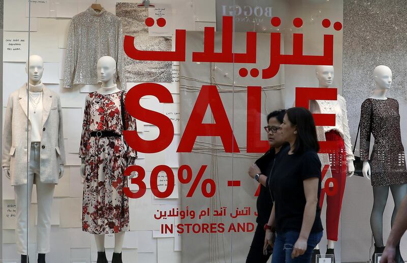 DUBAI, UNITED ARAB EMIRATES, Dec 26 – 2019 :- All the stores put up sale signs on the first day of Dubai Shopping Festival at Dubai Festival City Mall in Dubai. ( Pawan Singh / The National ) For News/Standalone 