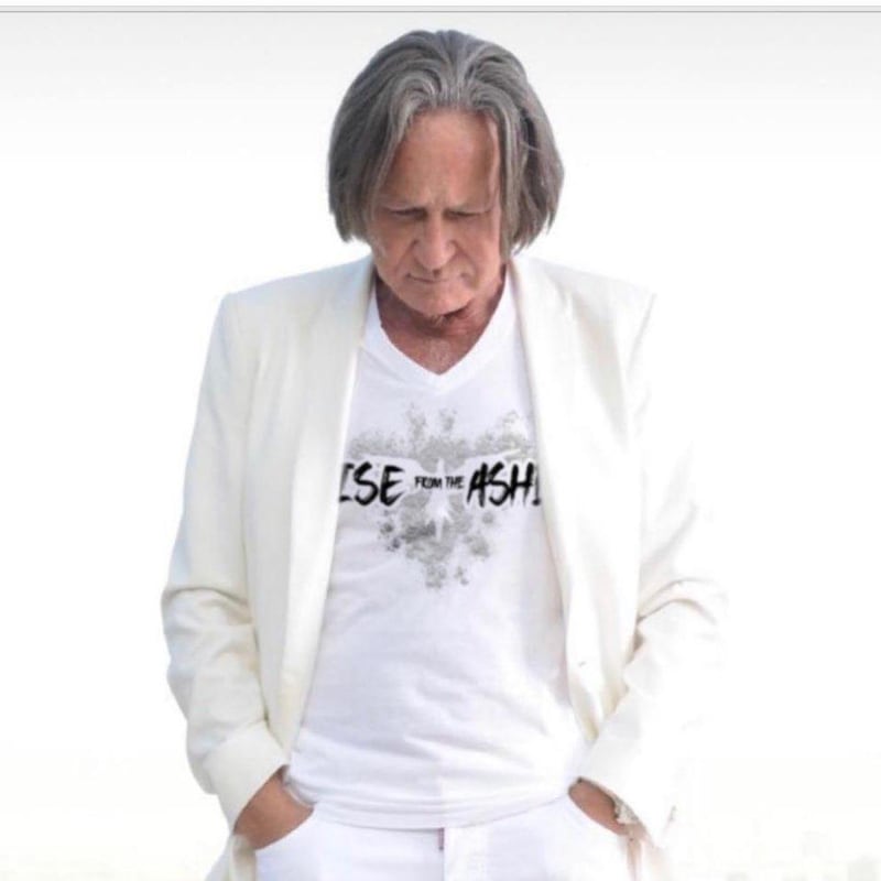 Palestinian-American property developer, and father of models Bella and Gigi Hadid, Mohamed Hadid wearing Zuhair Murad's Rise from the Ashes T-shirt. Instagram / mohamedhadid