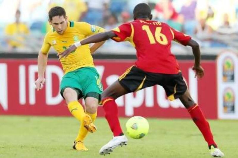 Dean Furman, right, earned praise from Bafana Bafana legend Steven Pienaar for his assured and controlled display in midfield for South Africa in their game against Angola. Anesh Debiky / Getty Images