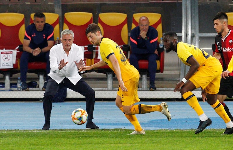 Jose Mourinho reacts as Tottenham's Ben Davies makes his play. Reuters