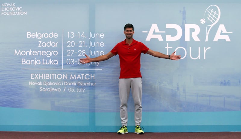 Serbian tennis player Novak Djokovic poses after the press conference in Belgrade, Serbia, Monday, May 25, 2020. Djokovic is planning to set up a series of tennis tournaments in the Balkan region while the sport is suspended amid the coronavirus pandemic. No professional tennis tournaments have been played since March. (AP Photo/Darko Vojinovic)