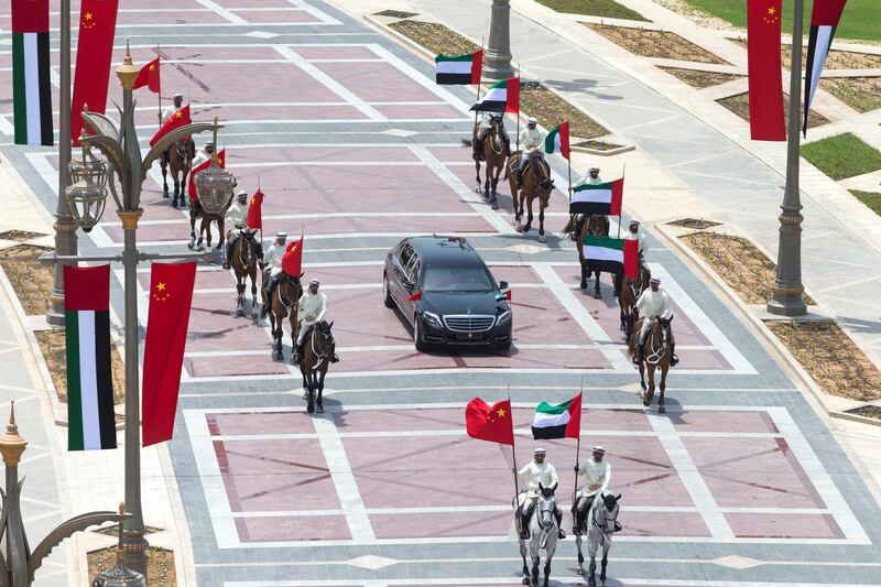 ABU DHABI, UNITED ARAB EMIRATES - July 20, 2018: Members of the UAE Armed Forces Cavalry Division escort HE Xi Jinping, President of China (in vehicle), upon his arrival at the Presidential Palace. 

( Mohamed Al Baloushi for Crown Prince Court - Abu Dhabi )
---