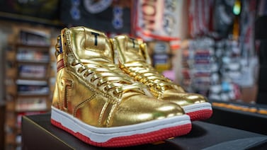 The gold Donald Trump shoes are said to be a 'hot item' at Trump Town USA. Joshua Longmore / The National
