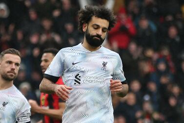 Liverpool's Egyptian striker Mohamed Salah reacts after missing his penalty kick during the English Premier League football match between Bournemouth and Liverpool at the Vitality Stadium in Bournemouth, southern England on March 11, 2023.  (Photo by Steve Bardens / AFP) / RESTRICTED TO EDITORIAL USE.  No use with unauthorized audio, video, data, fixture lists, club/league logos or 'live' services.  Online in-match use limited to 120 images.  An additional 40 images may be used in extra time.  No video emulation.  Social media in-match use limited to 120 images.  An additional 40 images may be used in extra time.  No use in betting publications, games or single club/league/player publications.   /  