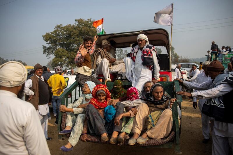 Villagers leave after a grand village council meeting as part of farmers' protests against farming laws, at Kandela, Jind district, in Haryana state, India. Reuters