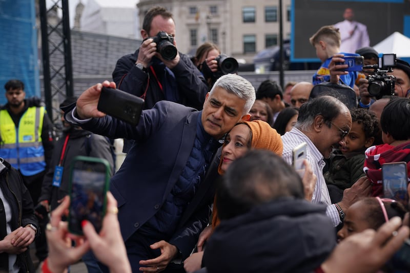 Mayor of London Sadiq Khan takes a selfie taken during the Eid celebrations. PA 