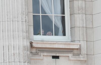 Prince Louis and Princess Charlotte are seen at the window of the Buckingham Palace as part of Trooping the Colour parade in London, Britain June 8, 2019. REUTERS/Hannah Mckay
