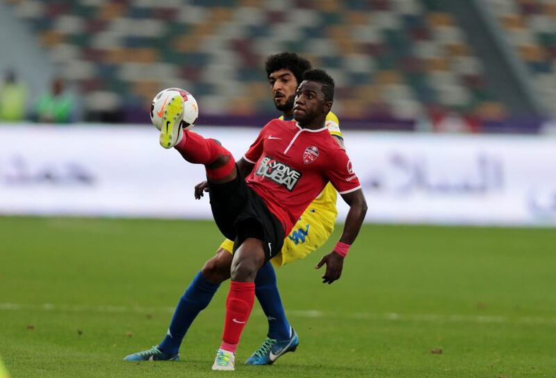 Al Ahli, in red, sit atop the Arabian Gulf League but know three teams are closing fast. Christopher Pike / The National

