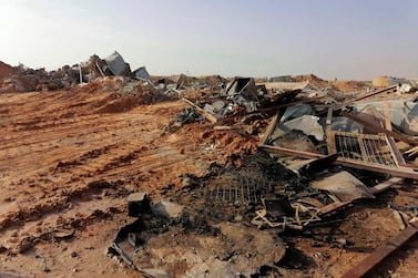 The ruins of the Kataib Hezbollah militia headquarters in Qaim, on the Iraqi side of the border with eastern Syria, after US air strikes on December 29, 2019. AP Photo