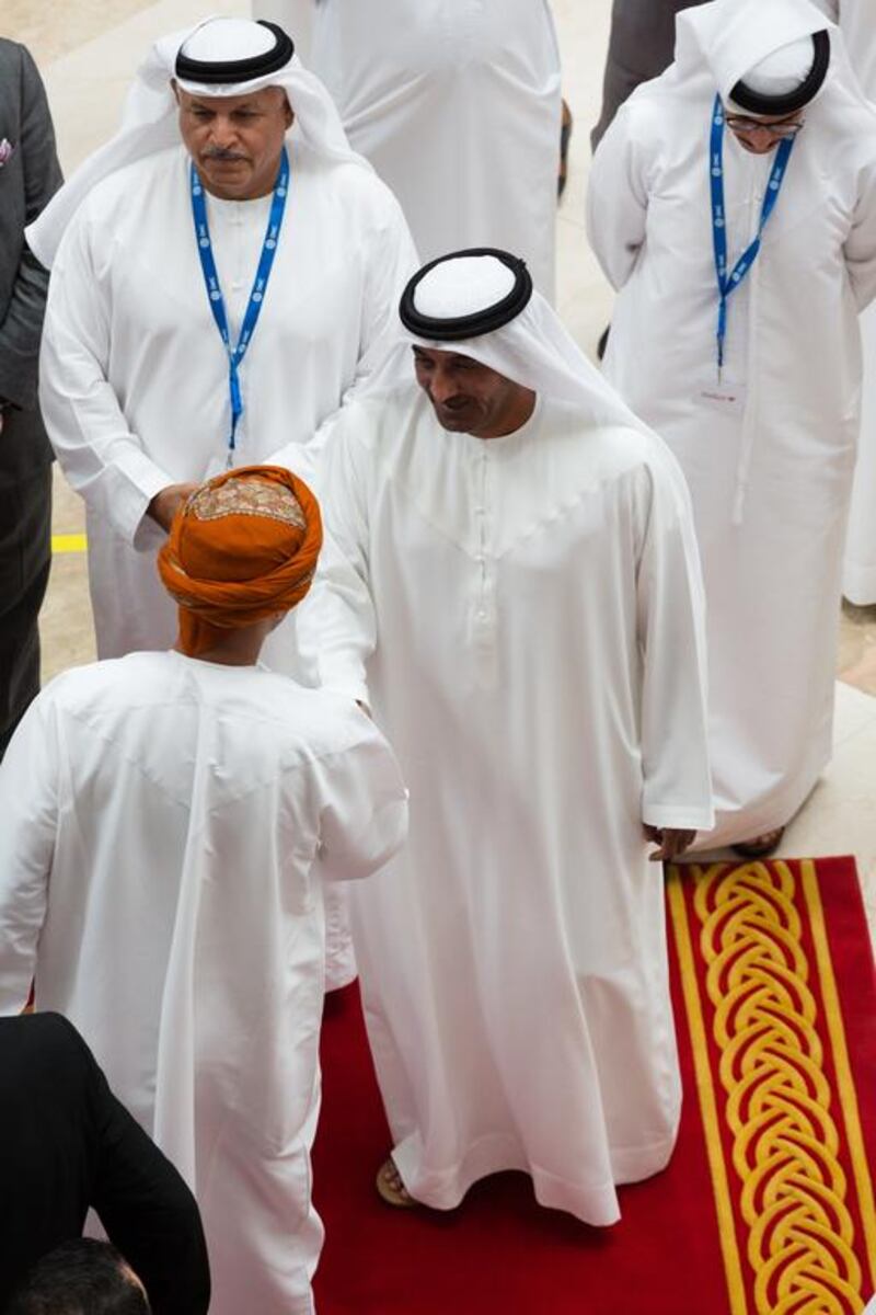 Sheikh Ahmed bin Saeed Al Maktoum, the president of the Dubai Civil Aviation Authority and chairman of Emirates Airline, centre, and Khalifa Al Zaffin, the executive chairman of Dubai Aviation City Corporation, rear left, attend Dubai Airport Show 2014. Duncan Chard for the National