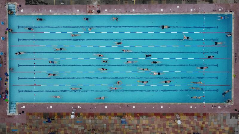 Swimmers in Hampton Lido in London on the first day of the easing of lockdown restrictions in England. Reuters