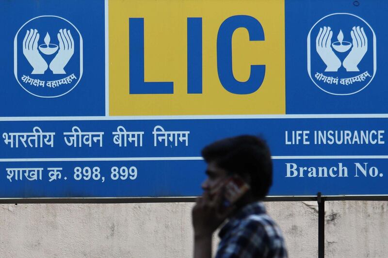 A man talks on a mobile phone outside the Life Insurance Corporation of India (LIC) branch in Mumbai, India on 02 February 2020. (Photo by Himanshu Bhatt/NurPhoto via Getty Images)