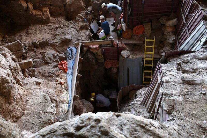 An archeological team from the University of Cambridge carry out excavations in the Shanidar Cave, 125kms north Erbil, Iraq.  EPA