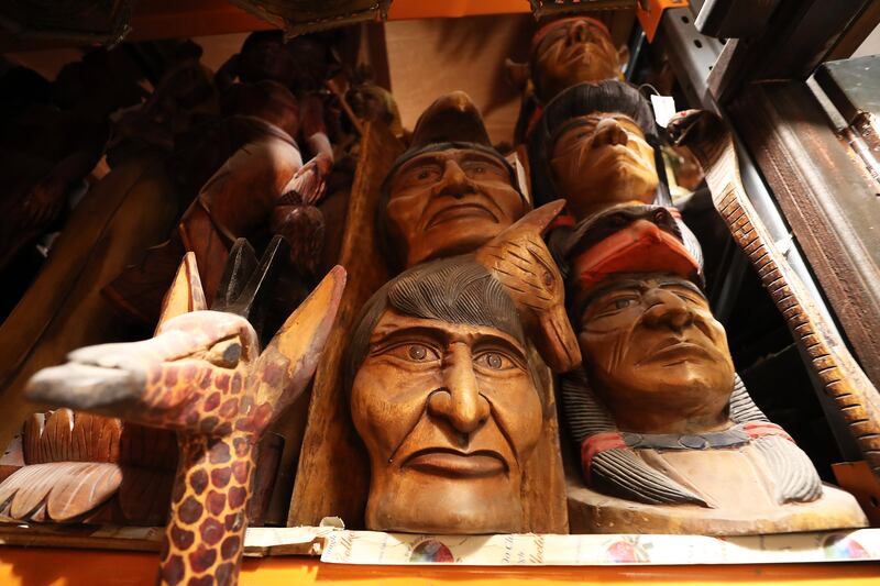 Red Indian statues from Thailand, priced from Dh1,000 to Dh3,000. The museum is 26 years old and run by Fakih Group of Companies. Pawan Singh / The National