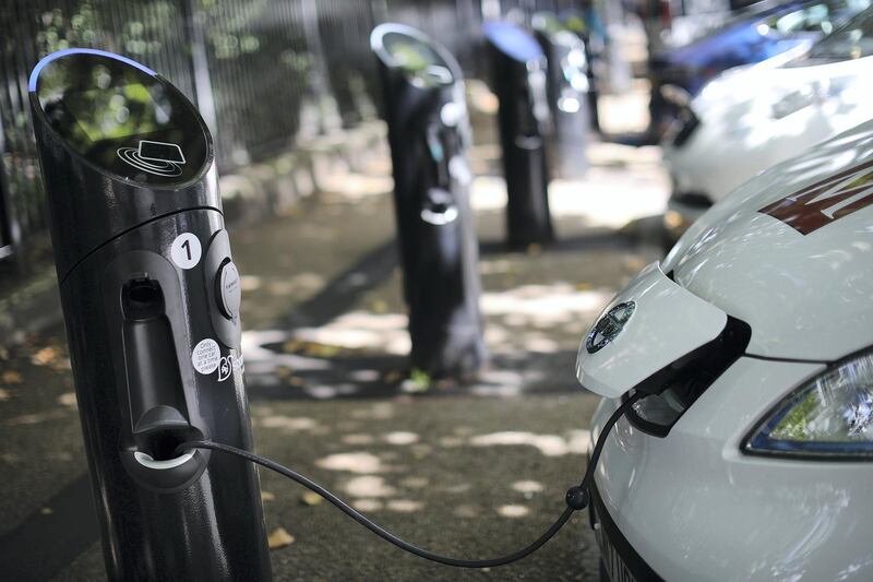 LONDON, ENGLAND - AUGUST 17:  A charging plug connects an electric vehicle (EV) to a charging station on August 17, 2017 in London, England. A study commissioned by power generation company Drax shows that current electric car models are twice as green as they were five years ago.  (Photo by Dan Kitwood/Getty Images)