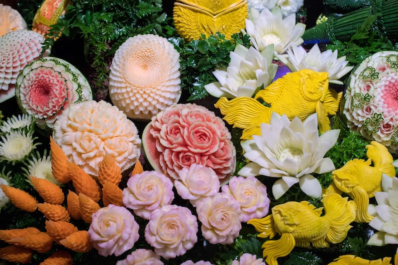 An elaborate display of carved fruits and vegetables is displayed during a fruit and vegetable carving competition in Bangkok. Robert Schmidt / AFP