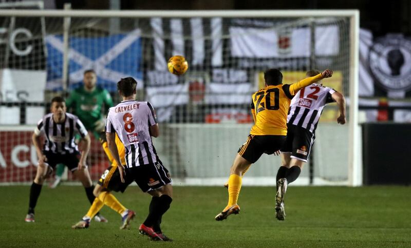 Wolverhampton Wanderers' Vitinha (second right) scores his side's first goal of the game during the Emirates FA Cup fourth round match at Victory Park, Chorley. Picture date: Friday January 22, 2021. PA Photo. See PA story SOCCER Chorley. Photo credit should read: Martin Rickett/PA Wire. RESTRICTIONS: EDITORIAL USE ONLY No use with unauthorised audio, video, data, fixture lists, club/league logos or "live" services. Online in-match use limited to 120 images, no video emulation. No use in betting, games or single club/league/player publications.