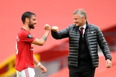 Manchester United manager Ole Gunnar Solskjaer congratulates Portuguese midfielder Bruno Fernandes, one of the best signings of the season. AFP