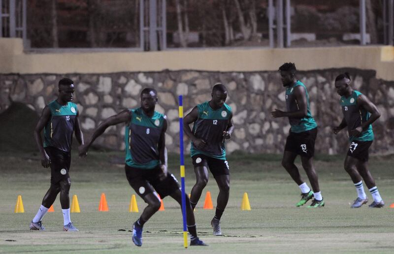 The Senegal players get in some fast movement. Reuters