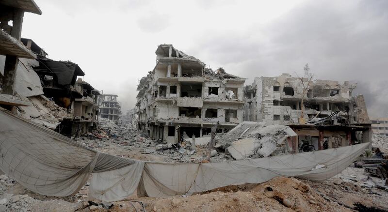 epa06755968 A general view for the damaged building in Yarmouk Camp district in south Damascus, Syria, 22 May 2018. Media reports state the Syrian government of Bashar al-Assad on 21 May recaptured the last area of Damascus under opposition control and took full control of the capital for the first time since the outbreak of the civil war in 2011, after groups of Islamic State (IS) fighters holed up in an area of south Damascus, including the Palestinian refugee camp Yarmouk, were bussed out.  EPA/YOUSSEF BADAWI