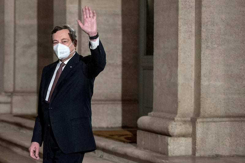 epa09007603 Italian Premier-designate Mario Draghi waves to photographers, in Rome, Italy, 12 February 2021. Premier-designate Draghi has formally accepted to lead a government after meeting with President Mattarella. Mattarella gave Draghi a mandate to form a government after outgoing Premier Conte's collapsed.  EPA/Roberto Monaldo / POOL