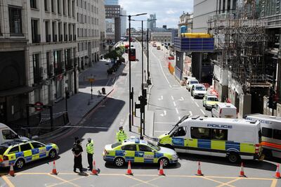 LONDON, ENGLAND - JUNE 04:  Police operate a cordon on the North side of London Bridge as forensic officers work after last night's terrorist attack on June 4, 2017 in London, England. Police continue to cordon off an area after responding to terrorist attacks on London Bridge and Borough Market where 7 people were killed and at least 48 injured last night. Three attackers were shot dead by armed police.  (Photo by Dan Kitwood/Getty Images)