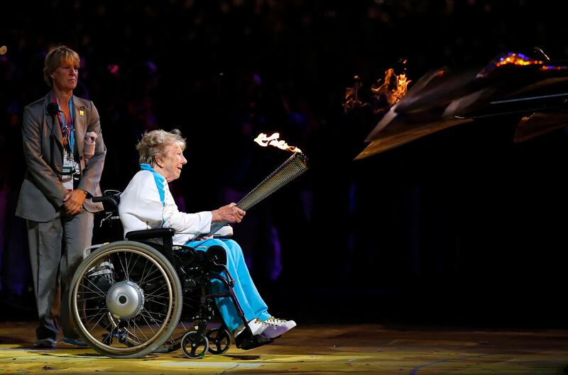 Margaret Maughan, Britain's first Paralympic gold medalist,  lights the Paralympic flame during the Opening Ceremony for the 2012 Paralympics in London, Wednesday Aug. 29, 2012. (AP Photo/Matt Dunham) *** Local Caption ***  London Paralympics Opening Ceremony.JPEG-0df9a.jpg