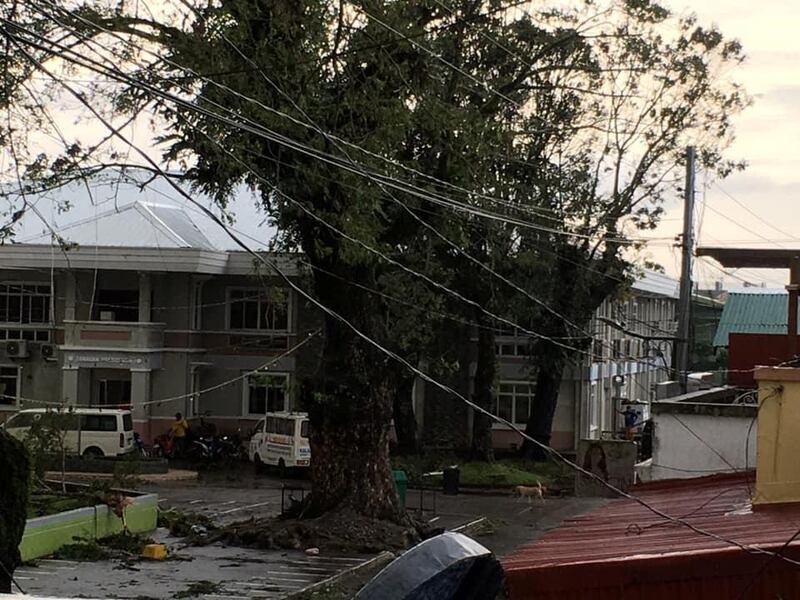 Fallen power lines dangle over buildings after Typhoon Phanfone swept through Tanauan, Leyte, in the Philippines. Reuters