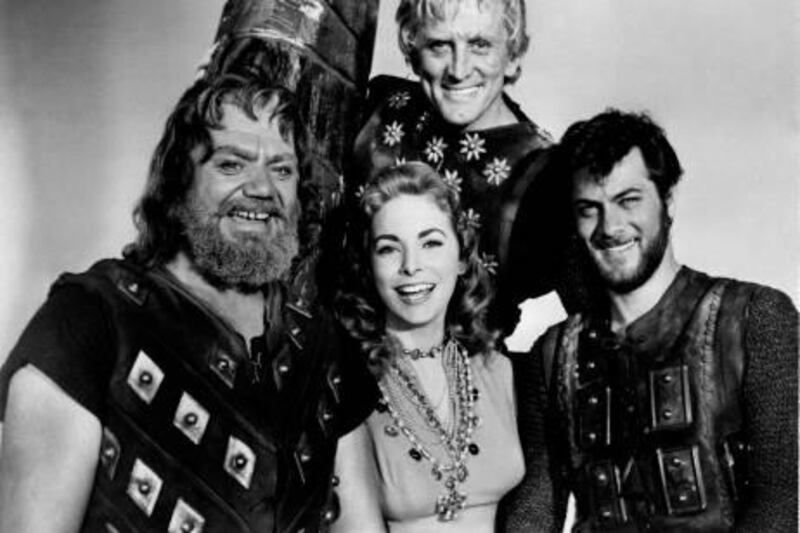RESTRICTED TO EDITORIAL USE -- NO ARCHIVES -- NOT FOR MARKETING OR ADVERTISING CAMPAING 

(FILES) -- A file photo taken in 1958 shows US actors (from L) Ernest Borgnine, Janet Leigh, Tony Curtis and Kirk Douglas on the set of "The Vikings ", directed by Richard Fleischer. Curtis, best known for his role opposite Marilyn Monroe in "Some Like It Hot," has died at the age of 85, US media reported on September 30, 2010, citing his family.   AFP PHOTO

 *** Local Caption ***  301813-01-09.jpg
