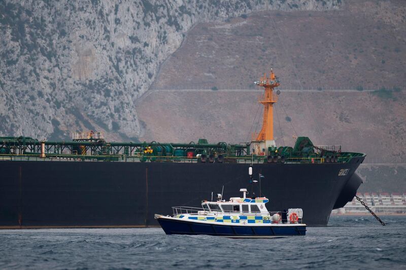A British Police ship patrols near supertanker Grace 1 off the coast of Gibraltar.  AFP