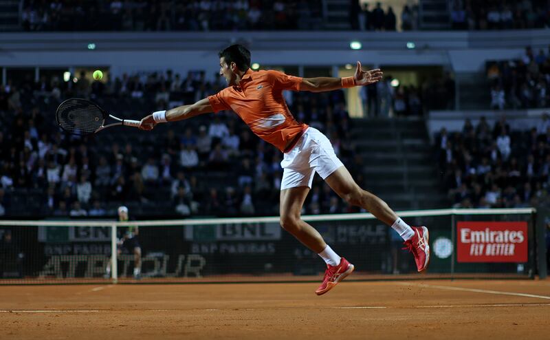 Novak Djokovic stretches for a return during the Italian Open semi-final against Casper Ruud. Getty