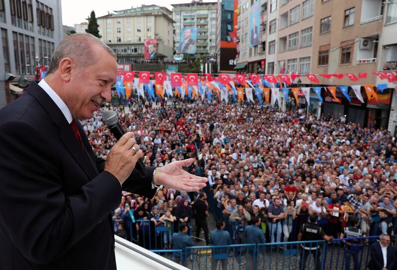 Turkish President Tayyip Erdogan addresses his supporters in Rize, Turkey August 11, 2018. Cem Oksuz/Presidential Palace/Handout via REUTERS ATTENTION EDITORS - THIS PICTURE WAS PROVIDED BY A THIRD PARTY. NO RESALES. NO ARCHIVE.