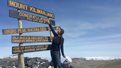 A handout photo of Selina Denman at the peak of Mont Kilimanjaro in Tanzania (Courtesy: Selina Denman) *** Local Caption ***  ut26no-secrets-kilimanjaro02.jpg