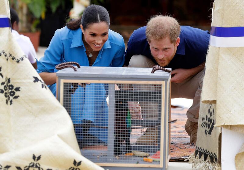 Prince Harry, Duke of Sussex and Meghan, Duchess of Sussex during a visit to Tupou College in Tonga. Getty Images