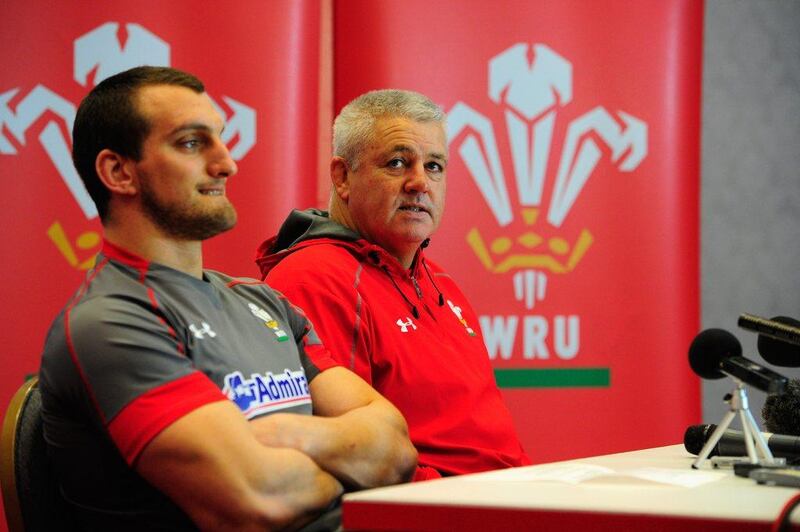 Wales captain Sam Warburton, left, and coach Warren Gatland face the press during the Wales team announcement on February 19, 2014. Stu Forster / Getty Images  