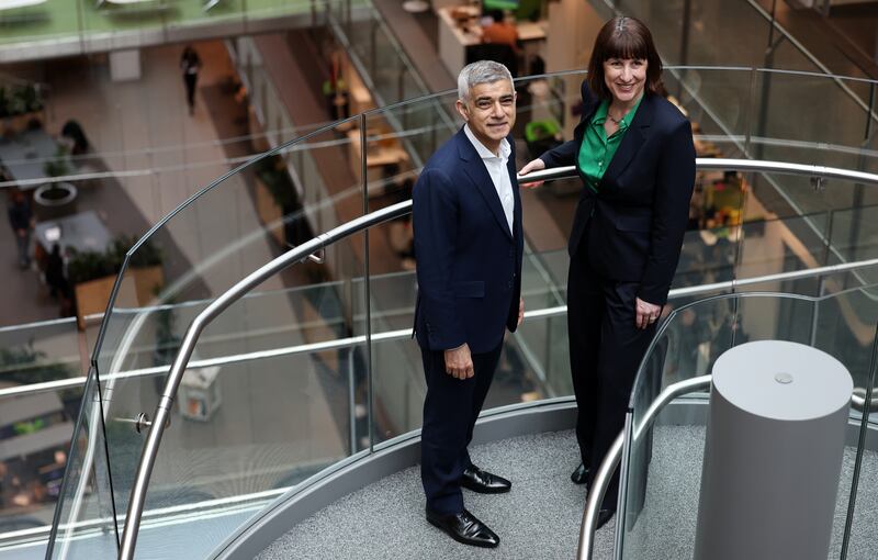 Mr Khan with Labour shadow chancellor Rachel Reeves at the Francis Crick Institute in London. EPA