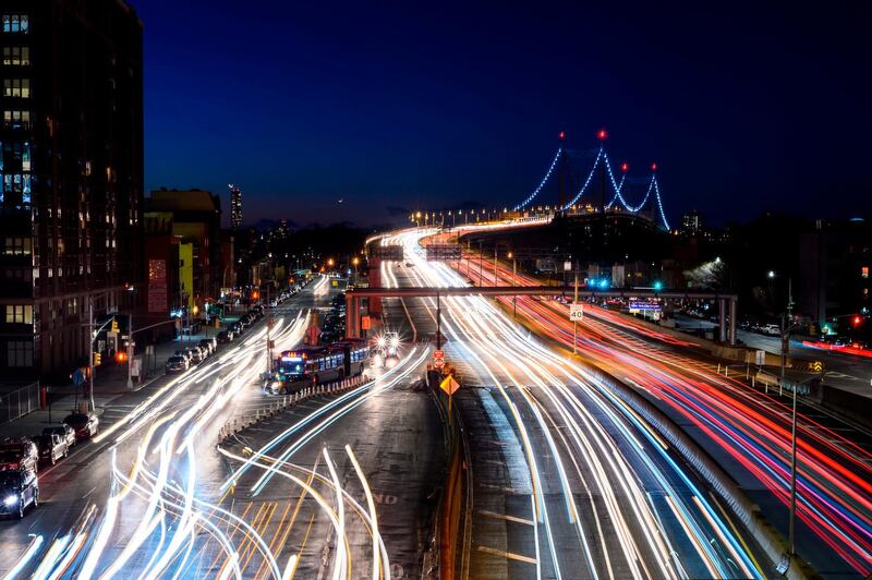 Cars make their way their way over the East River on the Robert F Kennedy Bridge into Queens in New York City. AFP