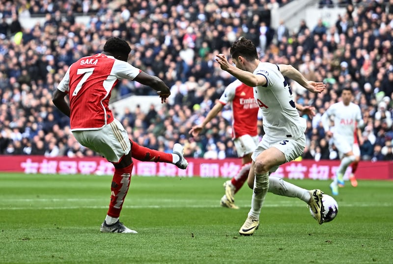 Arsenal's Bukayo Saka scores their second. Reuters
