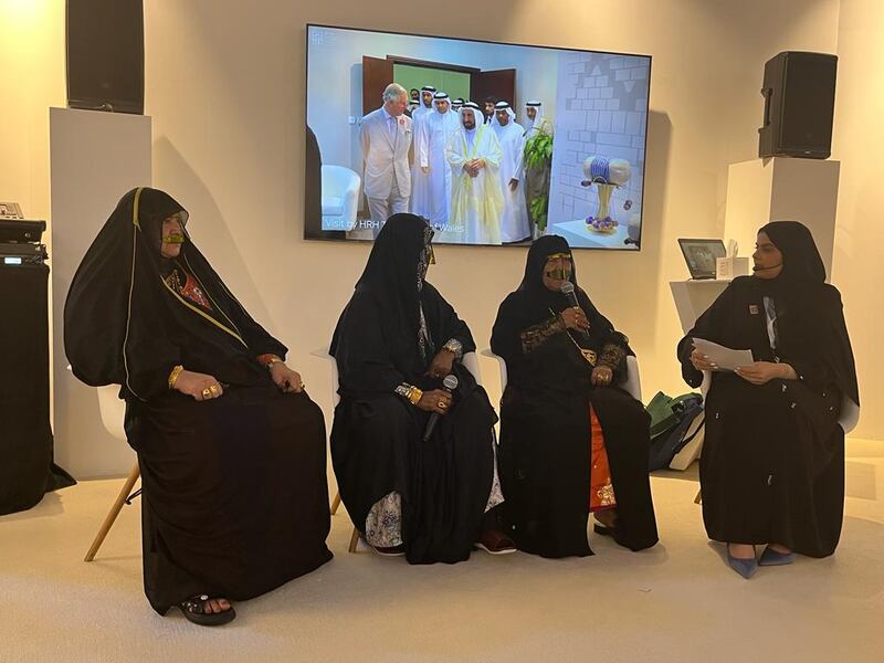 Emirati craftswomen Fatima Al Naqbi, Sheikha Al Dhuhoori, and Fatima Ahmad Mahmoud — known as "Umm Ahmed" — at an event explaining how a government initiative in Sharjah has helped them turn their passion into a profitable business. Photo: Salam Al Amir