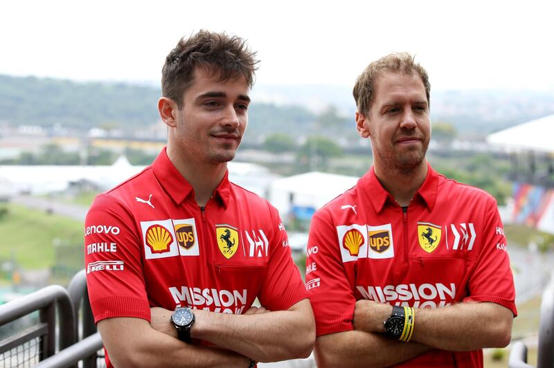 Charles Leclerc and Sebastian Vettel pose for a photo in Sao Paulo. Getty