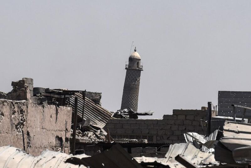 The leaning Al Hadba minaret, which is part of the Al Nuri mosque in the Old City of Mosul, seen on June 19, 2017 as the Iraqi forces advance during the offensive to retake the last district still held by ISIL fighters. Mohamed El Shahed/AFP

