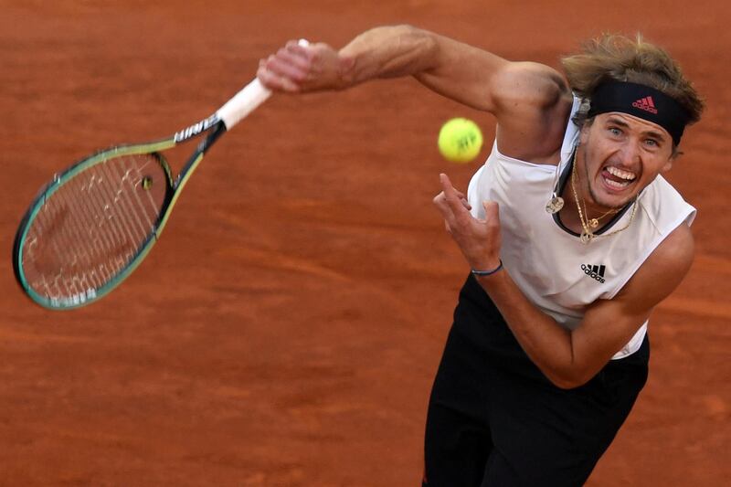 Germany's Alexander Zverev serves to Great Britain's Daniel Evans during their 2021 ATP Tour Madrid Open match, won 6-3, 7-6 by Zverev, at the Caja Magica in Madrid. AFP