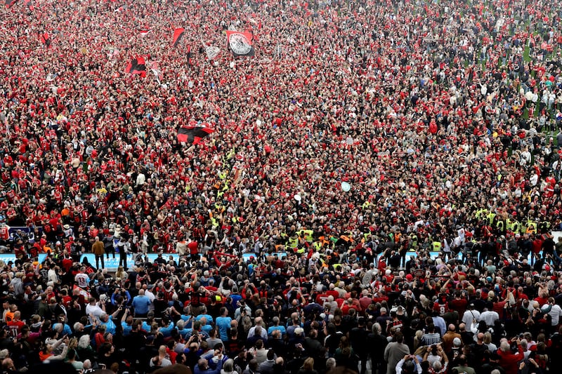 Fans of Bayer Leverkusen invade the pitch. Getty Images 