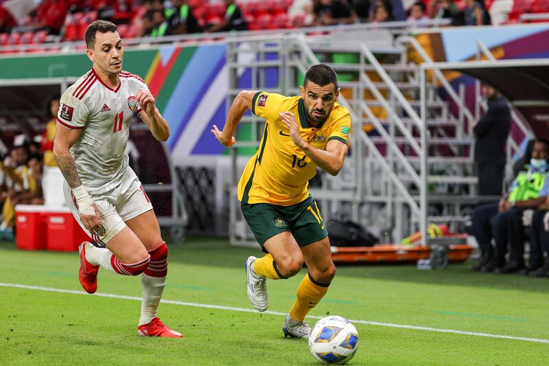 UAE forward Caio Canedo marks Australia's defender Aziz Behich during their World Cup 2022 play-off. AFP