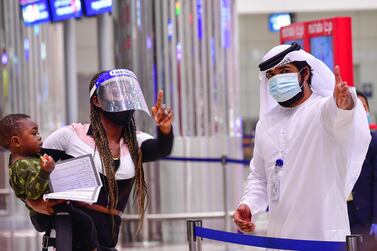 Passengers travelling from a country without a UAE-approved testing facility can arrange a Covid-19 PCR test with a local medical centre. AFP