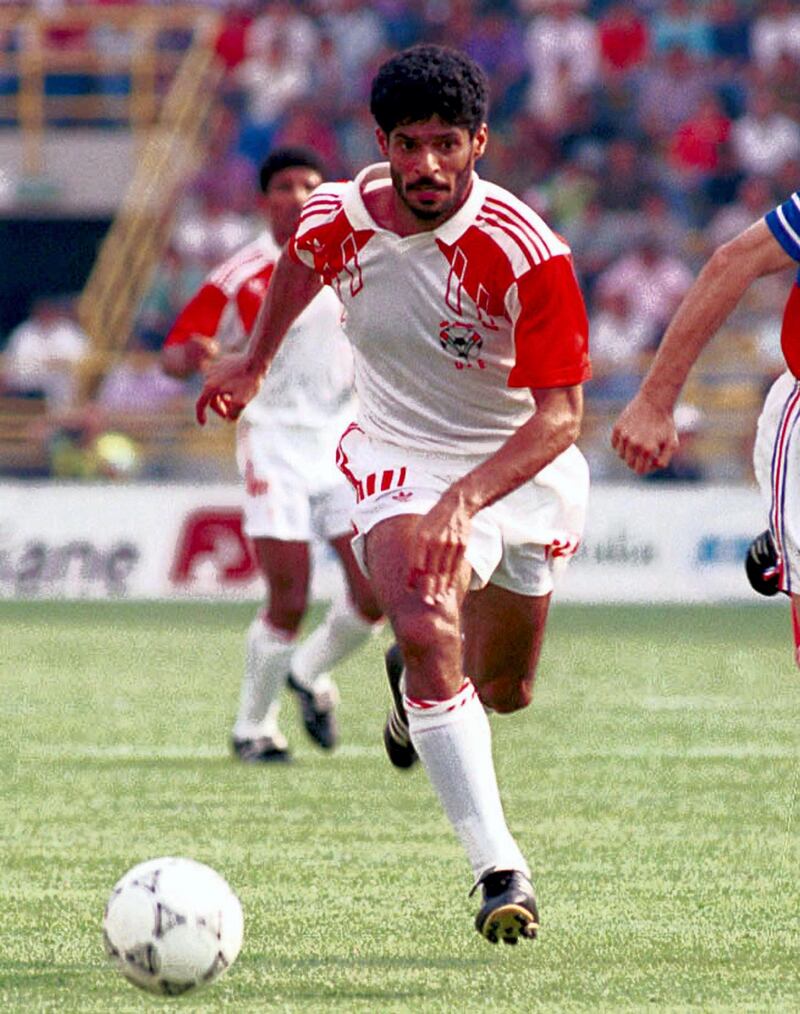 TO GO WITH AFP 2010 WORLD CUP PACKAGE IN ARABIC
(FILES) A picture taken on June 19, 1990 shows Emirati forward Adnan al-Talyani fighting for the ball during the World Cup Group D first round match between United Arab Emirates and Yugoslavia at the Renato Dall'Ara stadium in Bologna, Italy. Yugoslavia won 4-1. AFP PHOTO/Nader DEL RIO (Photo by NADER DEL RIO / AFP)